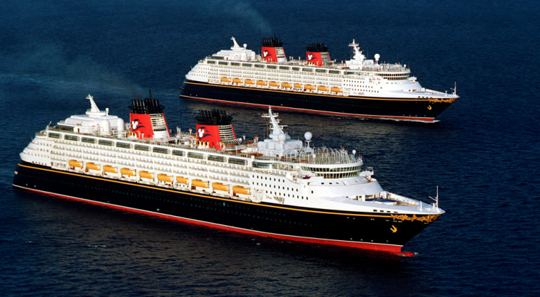 The 'Disney Wonder' (Front) and 'Disney Magic' at sea. Both ships have amenities to keep kids and adults entertained.